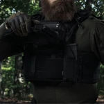 Боковой левосторонний эластичный подсумок для магазинов АК/АR и турникетов открытого типа с креплением на липучке. Черный 7 Боковой левосторонний эластичный подсумок для магазинов АК/АR и турникетов открытого типа с креплением на липучке. Черный 7